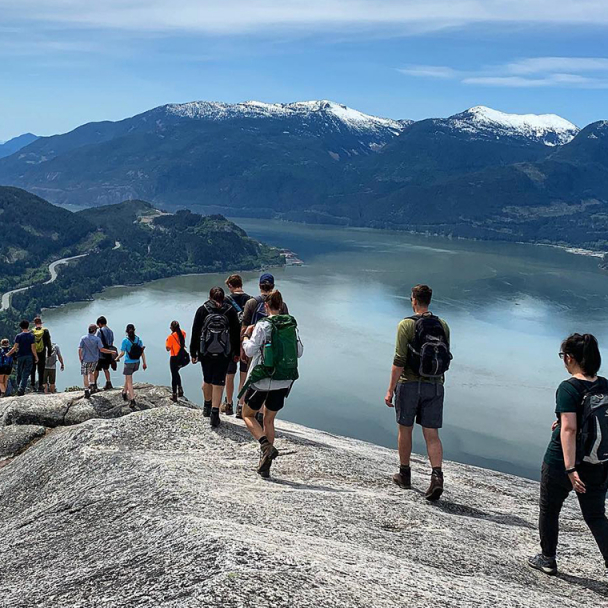 Group of Canadian youngsters hiking in the mountains